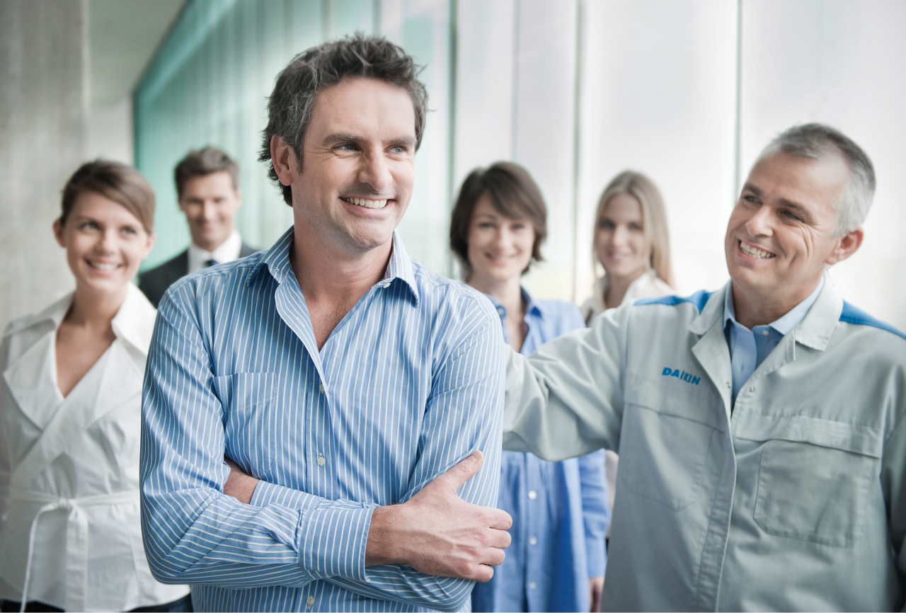 Daikin team close up ladies and men