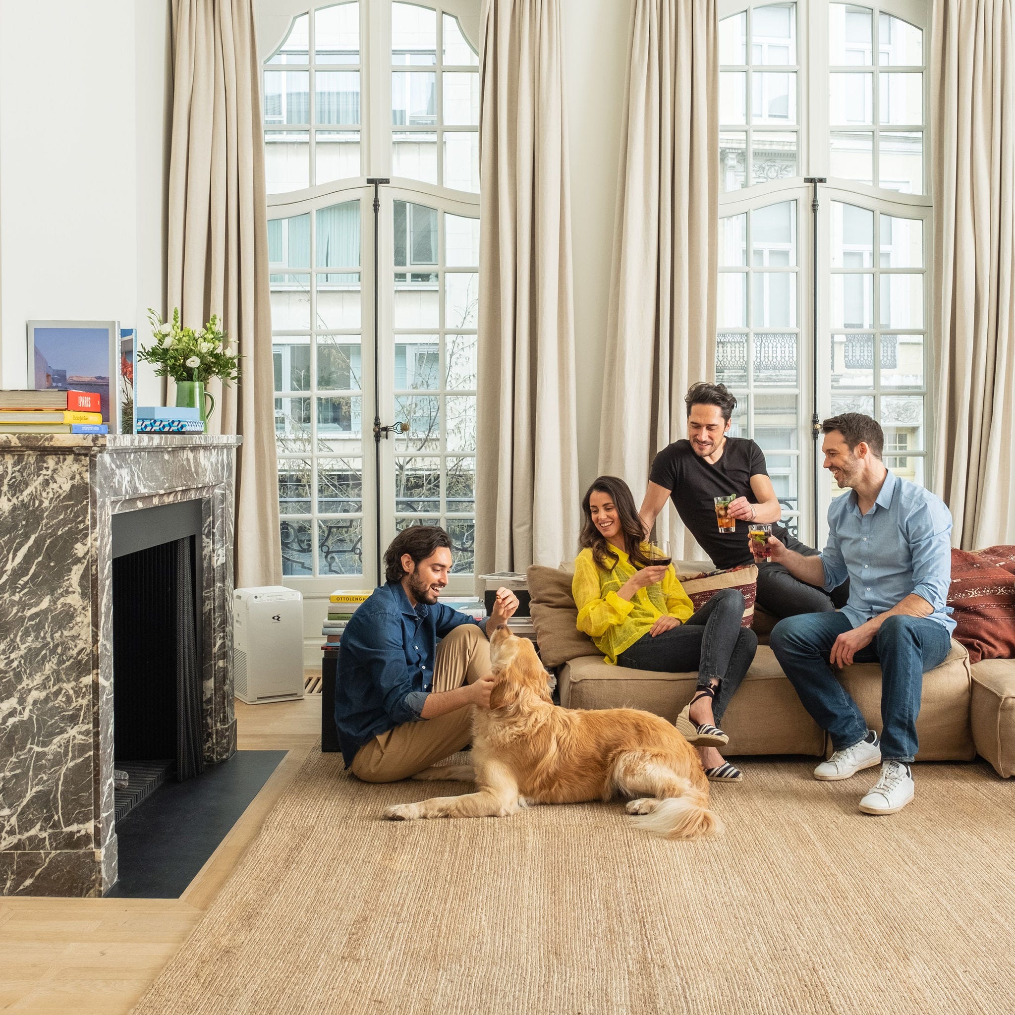 Daikin Air Purifier in background of friends
