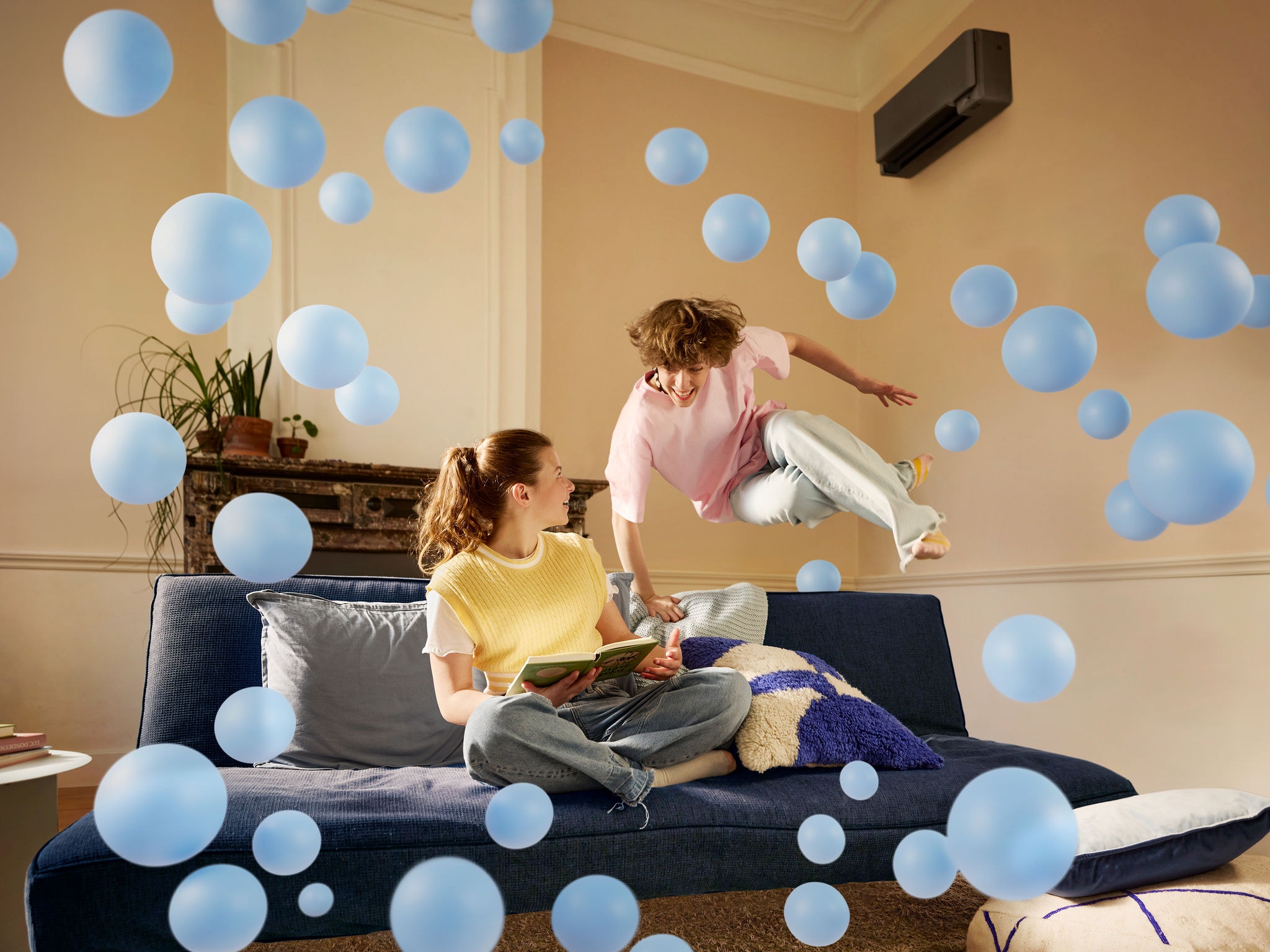 Blue bubbles cool ir with Daikin AC kids in living room