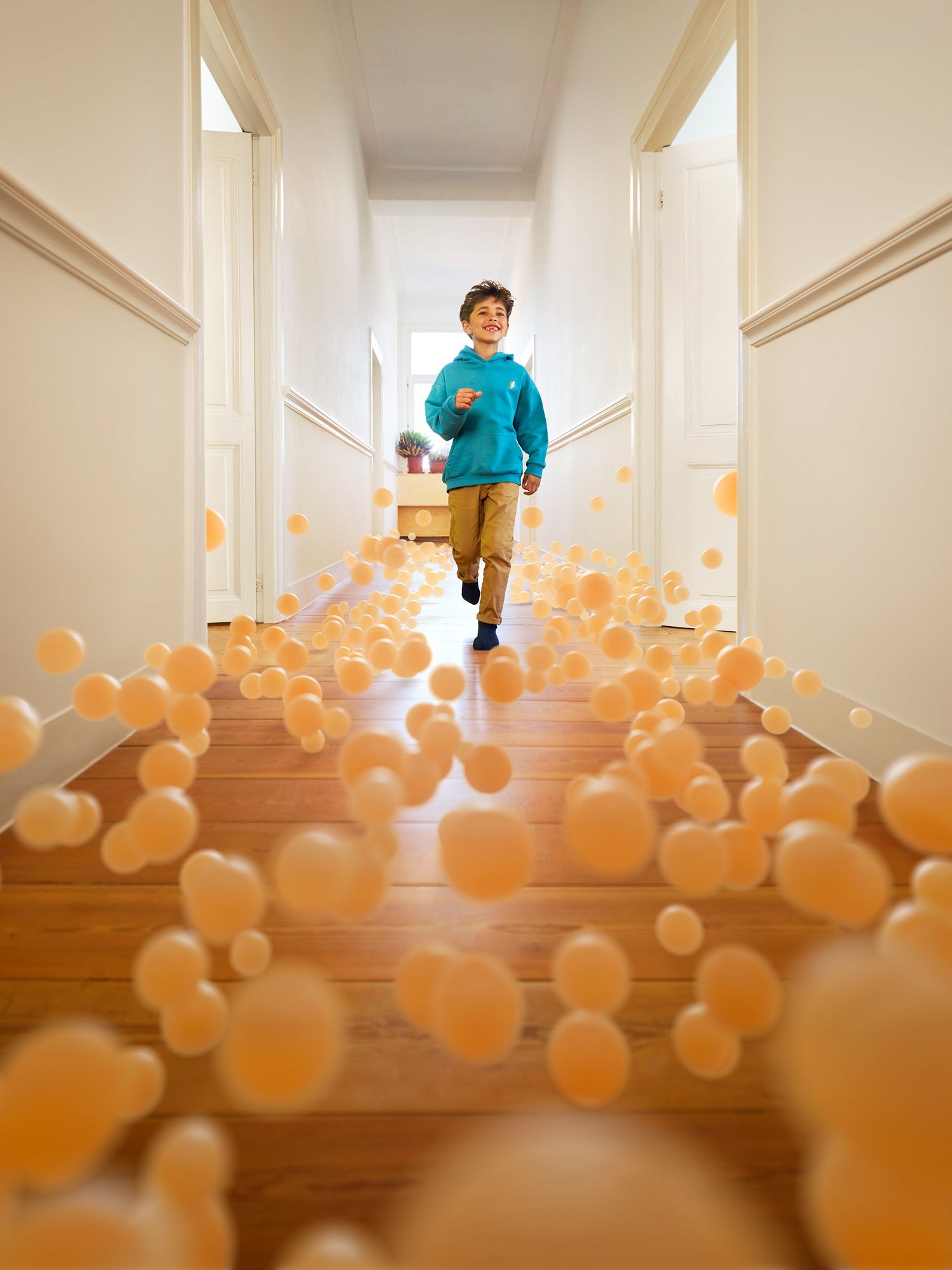 mother and baby in room with Perfera air conditioner