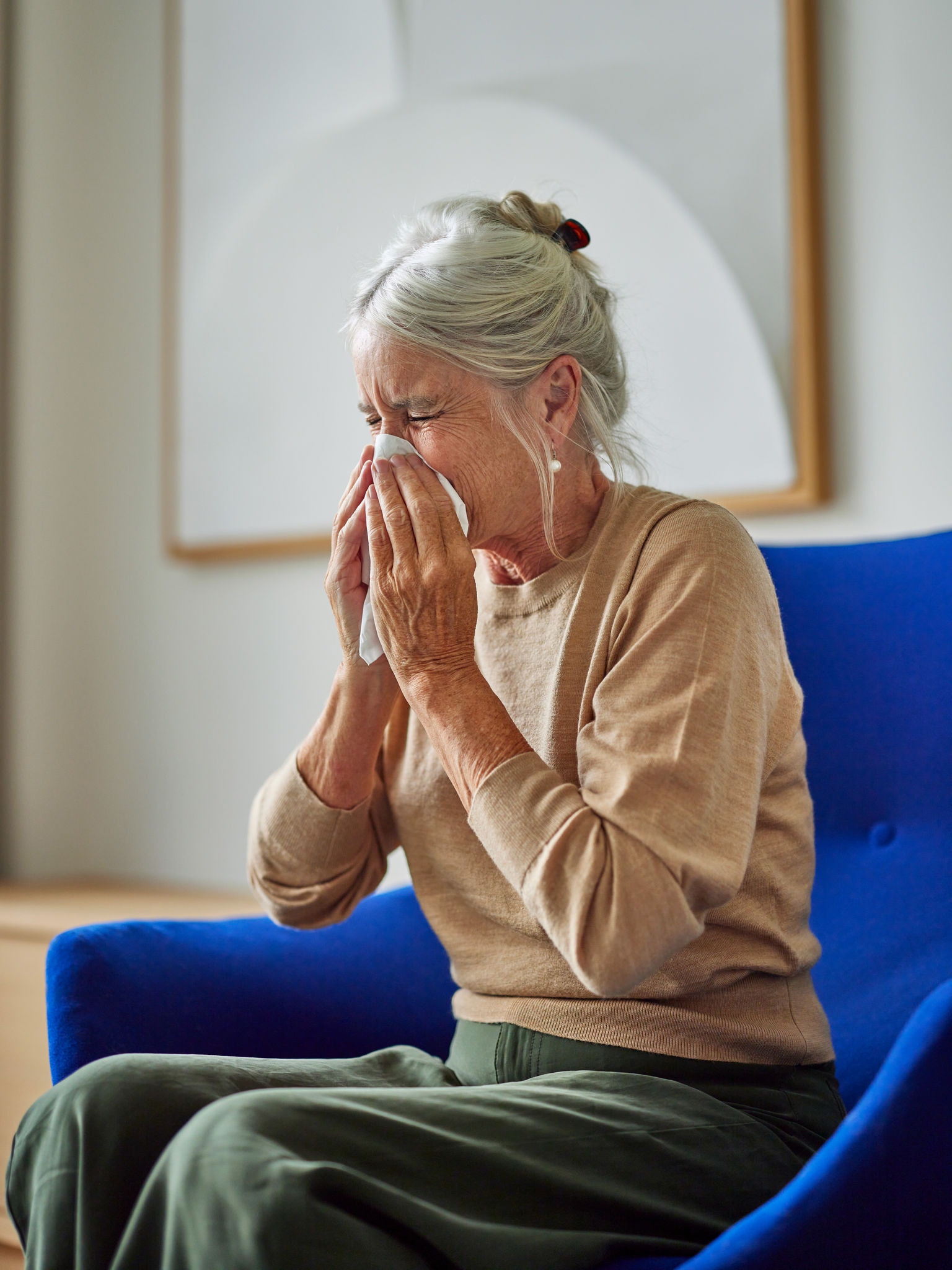 Woman suffering allergies due to pollen