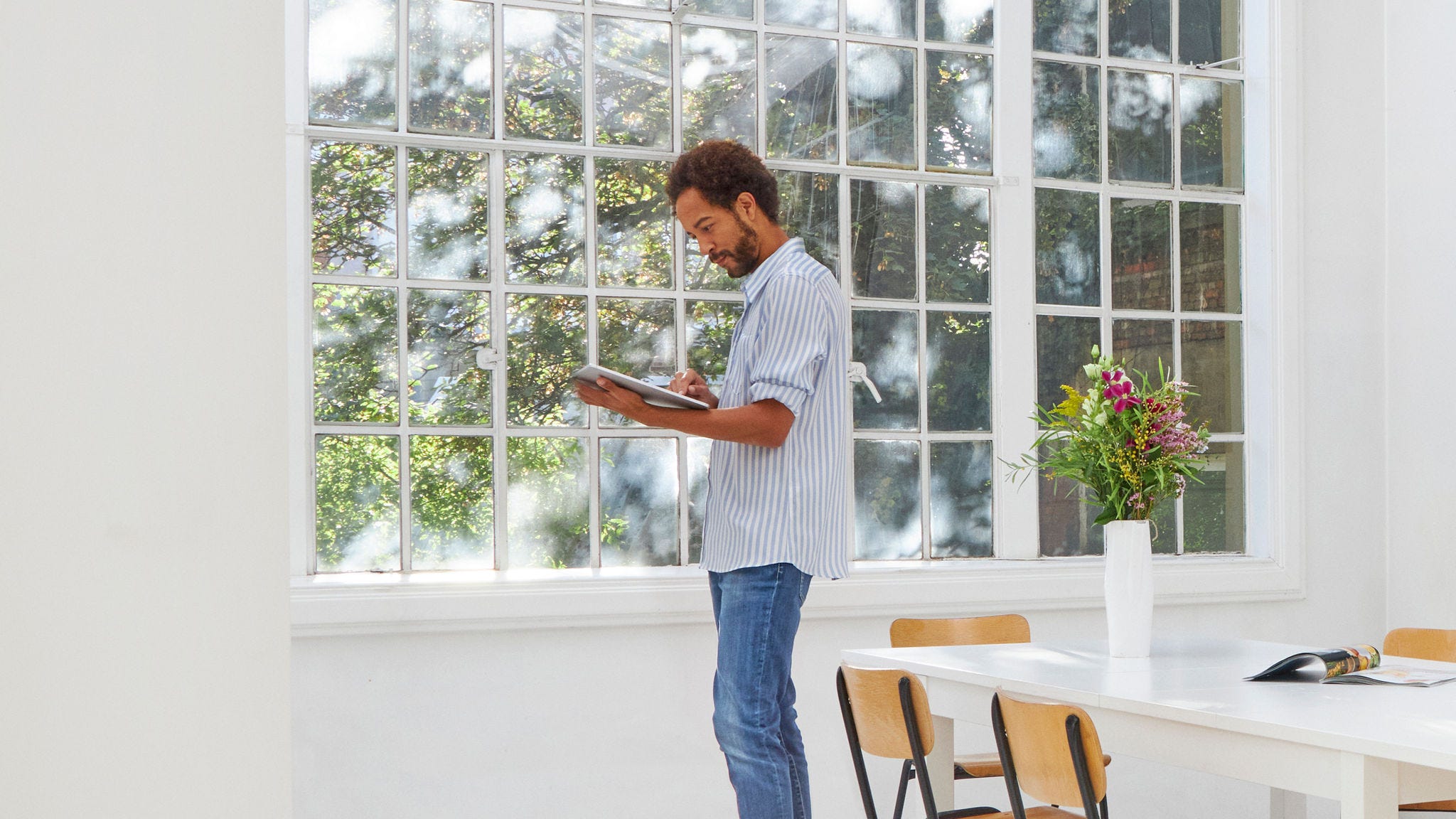 Man exploring the Daikin heat pumps to replace his current heating system