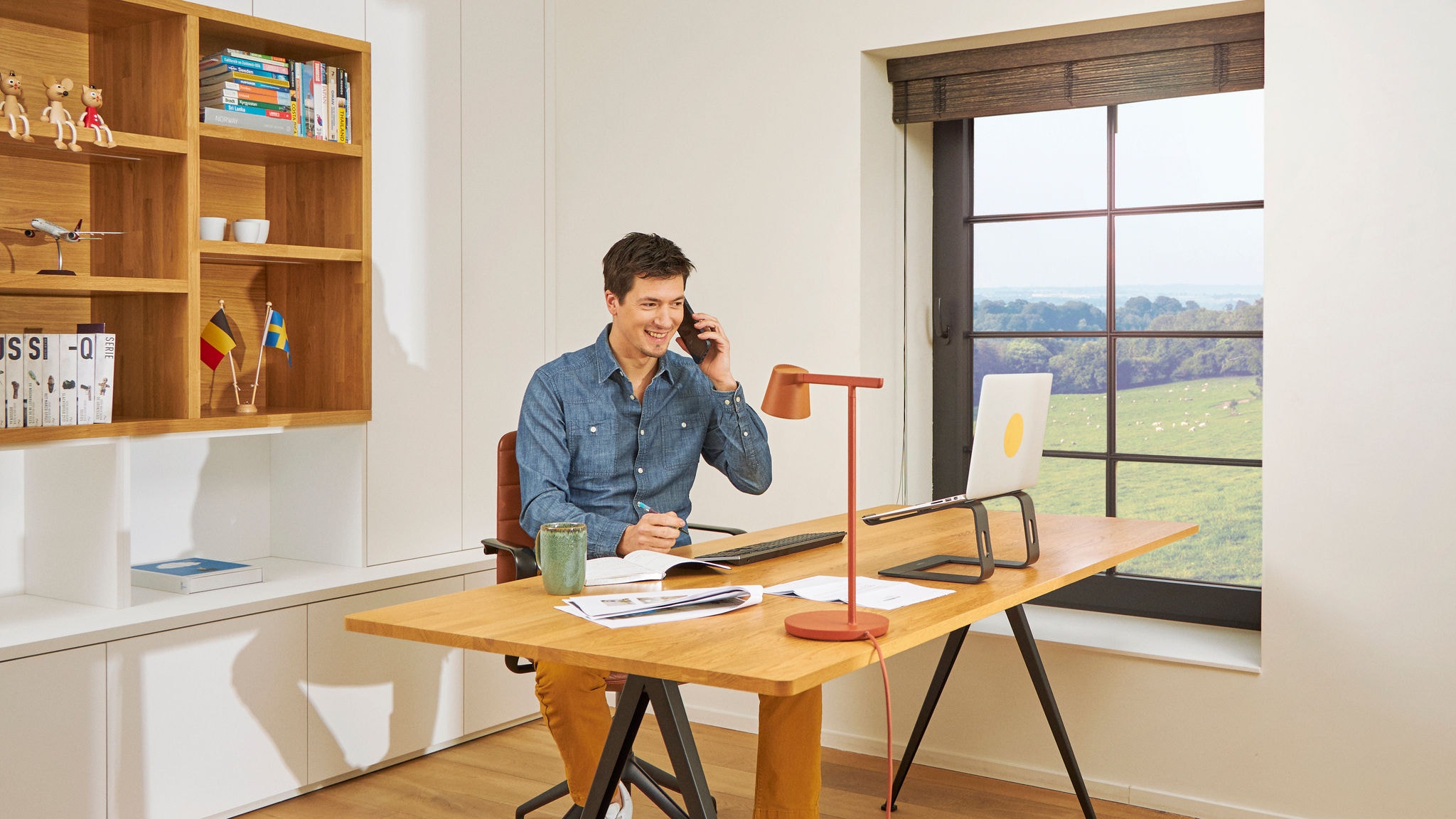A man calling in his office
