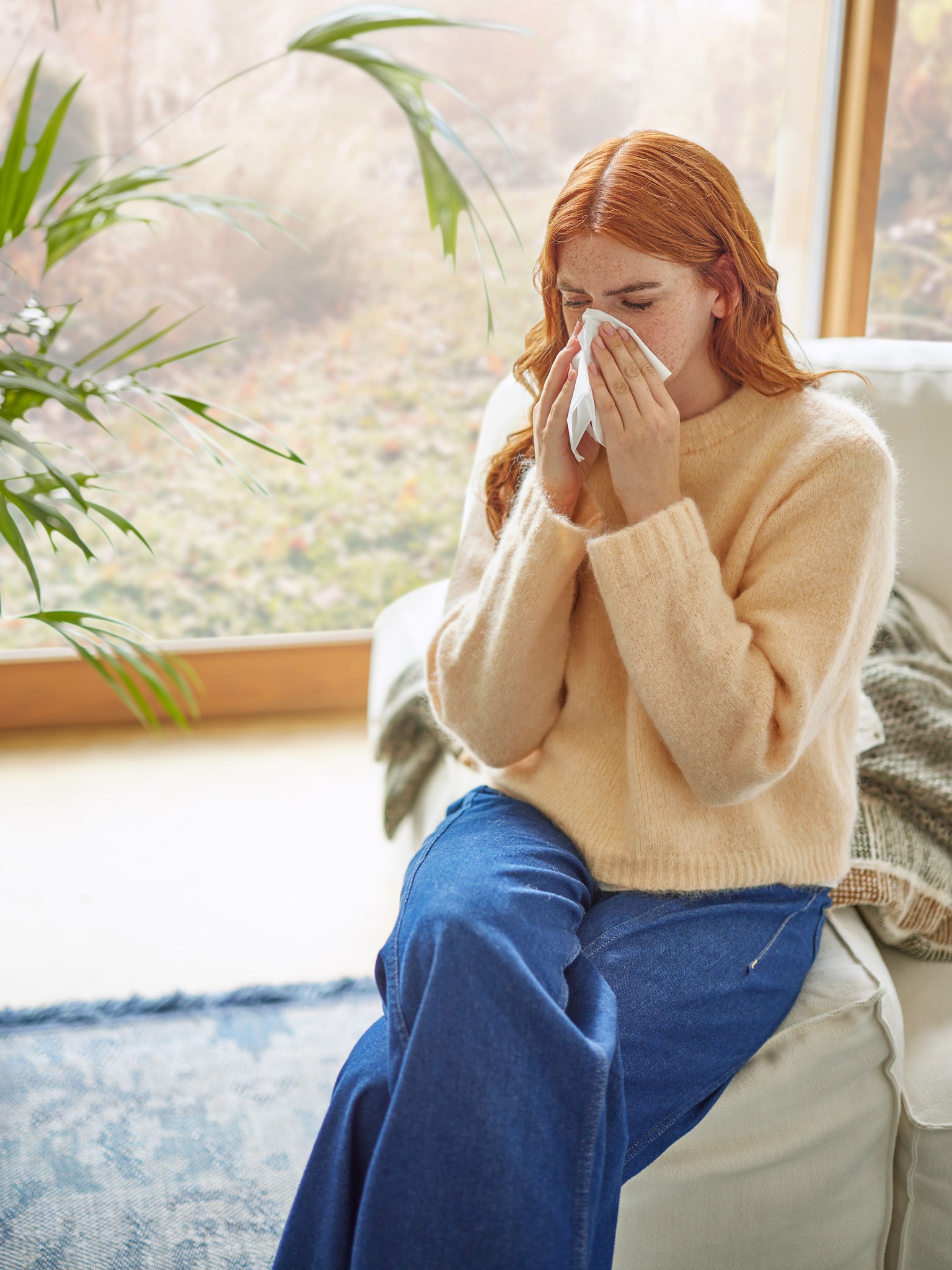 Woman suffering from household dust