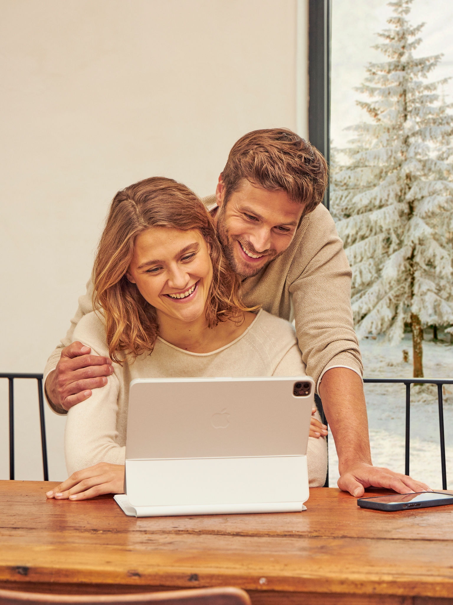 Couple looking up information about air conditioners